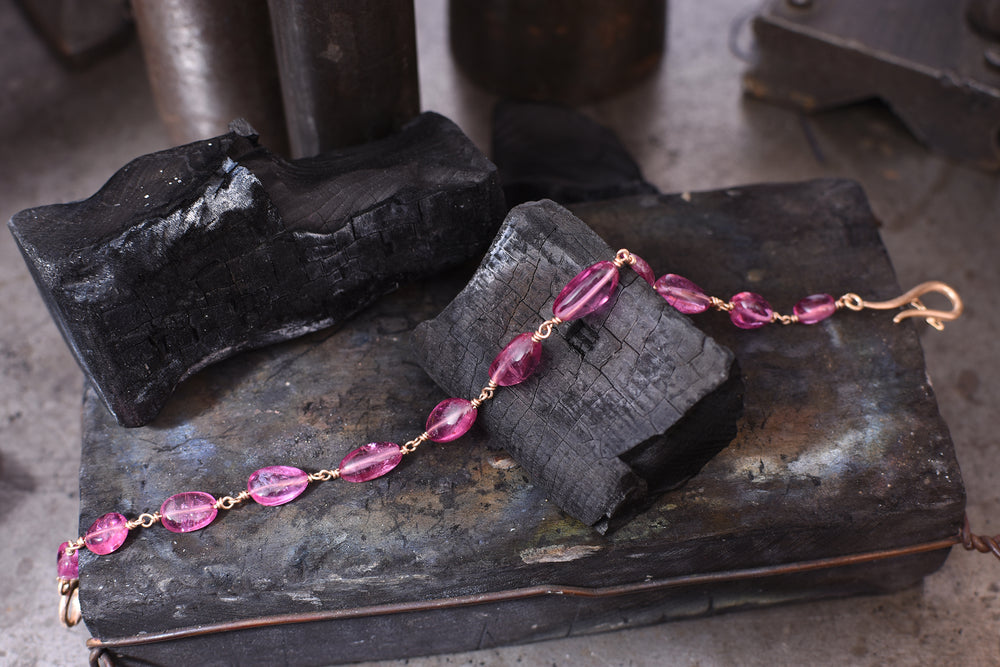 Baby pink tourmaline and 18ct rose gold bracelet.